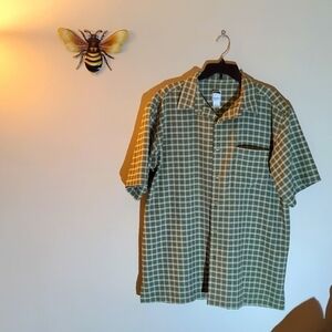 The North Face button up, XL, green and white. The fabric is thicker type fabric